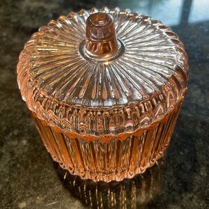 Peach (clear) bowl with lid.